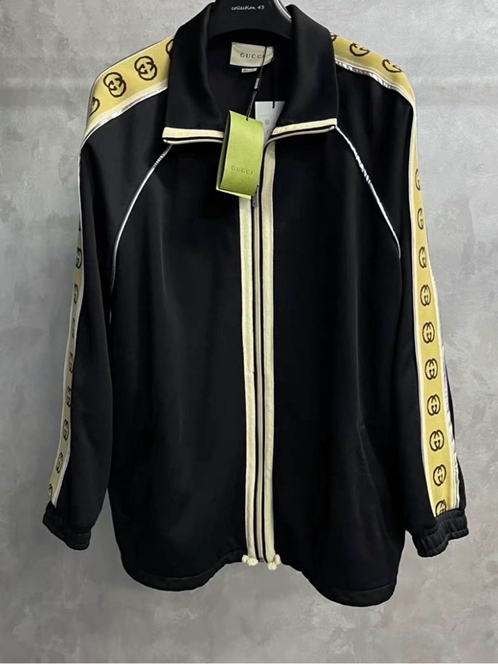 Gucci Black Jacket with Yellow Logo Stripe
